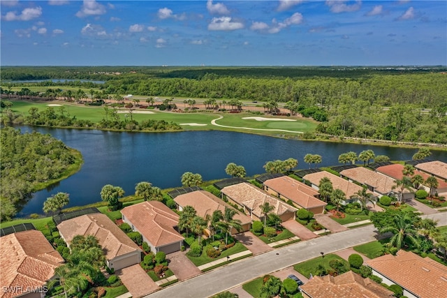 drone / aerial view with a water view