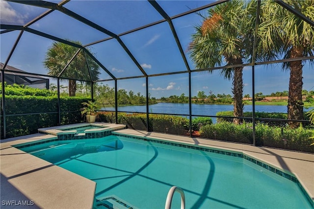 view of swimming pool featuring an in ground hot tub, a water view, and glass enclosure