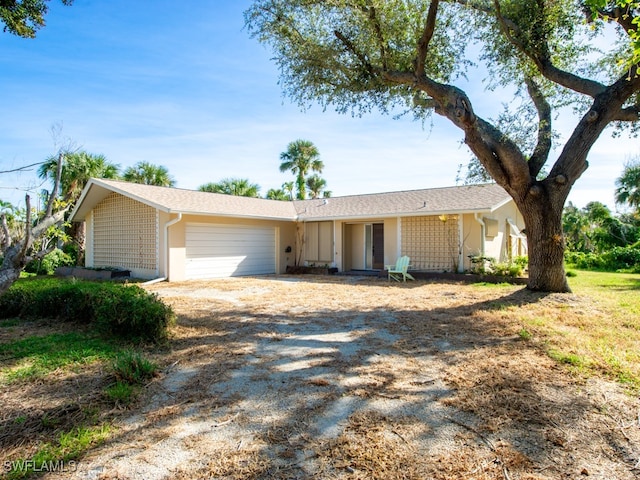 ranch-style house with a garage