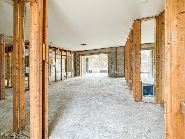 unfurnished living room featuring a healthy amount of sunlight