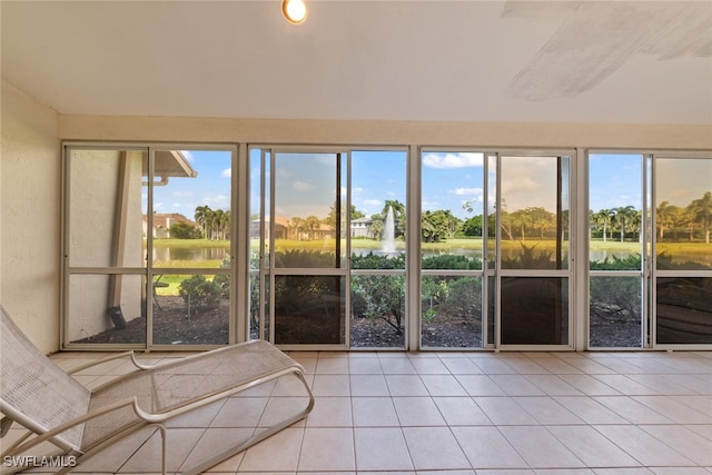 unfurnished sunroom featuring a healthy amount of sunlight