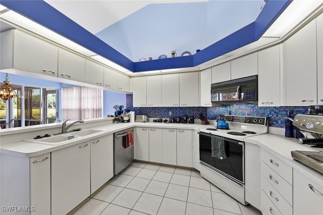 kitchen featuring tasteful backsplash, white electric stove, dishwasher, black microwave, and a sink