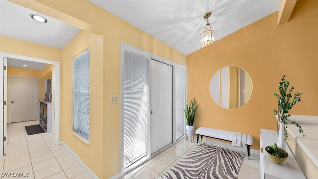 entrance foyer featuring light tile patterned floors