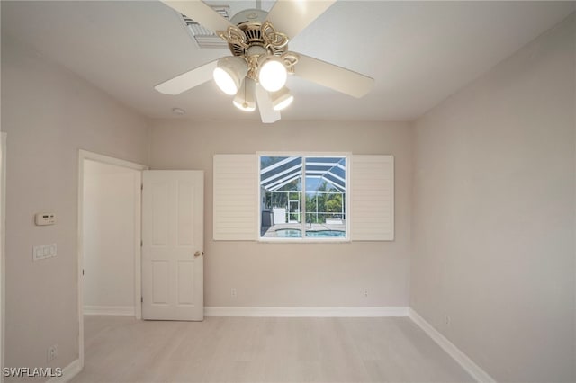 unfurnished room featuring ceiling fan and light hardwood / wood-style flooring