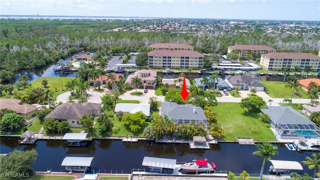 drone / aerial view featuring a water view