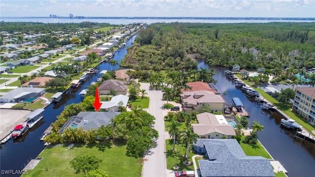 bird's eye view with a water view