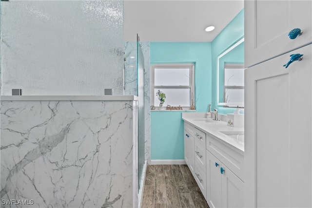 bathroom featuring vanity and walk in shower