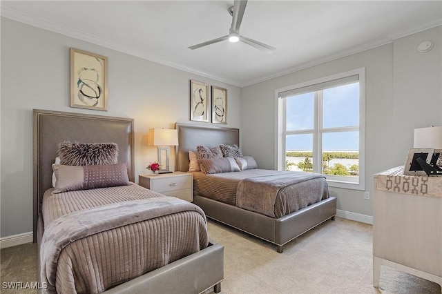 bedroom with light colored carpet, ceiling fan, and ornamental molding