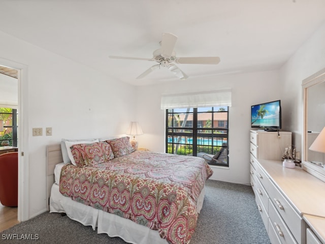 bedroom featuring carpet floors, ceiling fan, and access to exterior