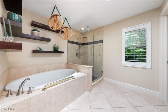 bathroom with tile patterned flooring and independent shower and bath