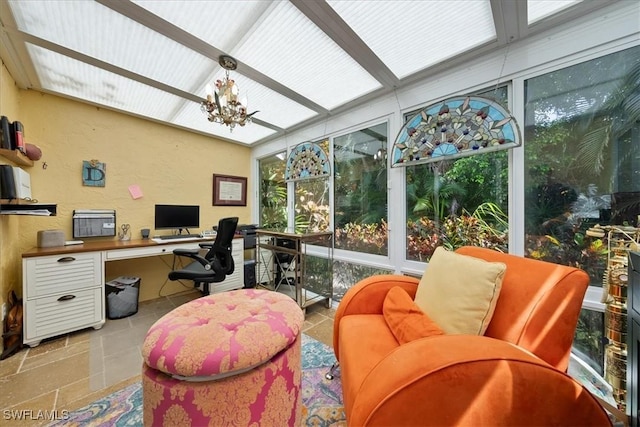 sunroom / solarium with a notable chandelier