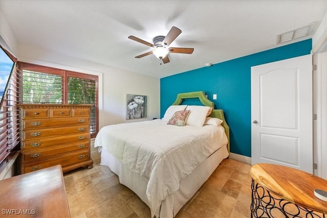 bedroom featuring ceiling fan