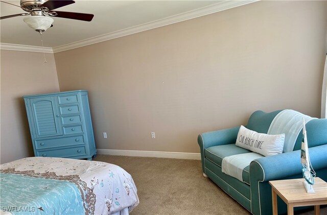 bedroom with light carpet, ceiling fan, and crown molding