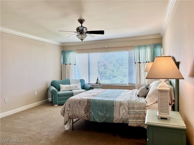 bedroom with ceiling fan, carpet floors, and crown molding