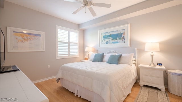 bedroom featuring light wood-type flooring and ceiling fan