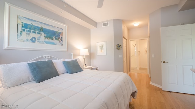 bedroom with ceiling fan and light wood-type flooring