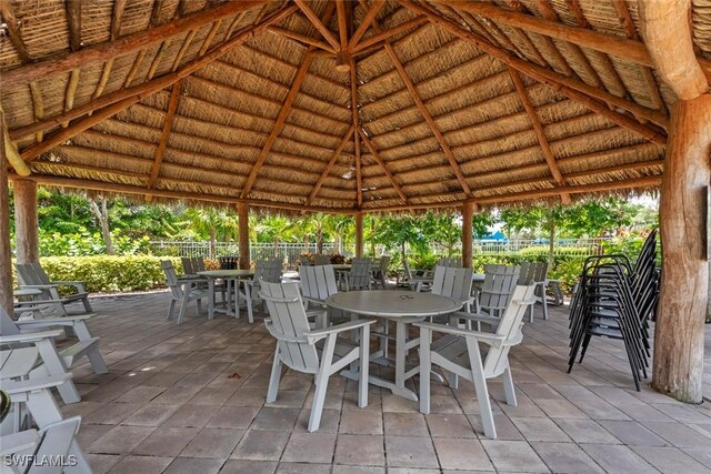 view of patio with fence and a gazebo