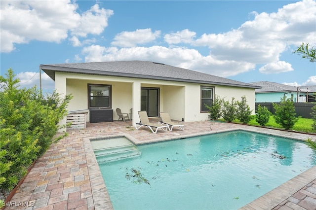 view of pool featuring a patio