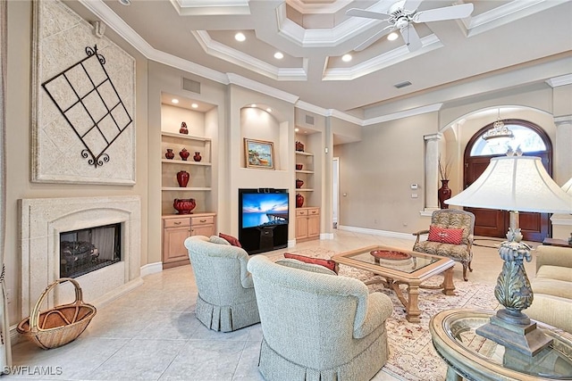 living room with ornamental molding, coffered ceiling, a high end fireplace, and built in shelves