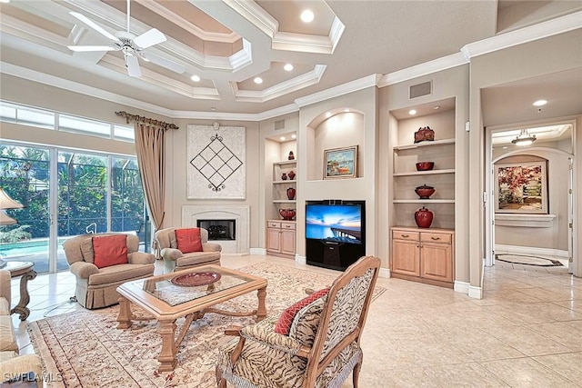 living room with built in shelves, coffered ceiling, crown molding, ceiling fan, and a high end fireplace