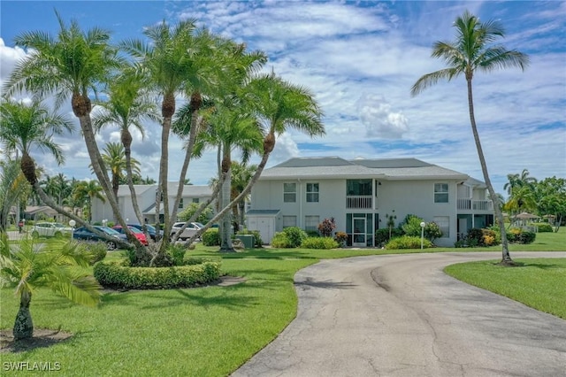 view of front of home with a front yard