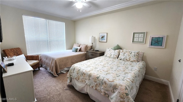 bedroom featuring ornamental molding, carpet floors, and ceiling fan