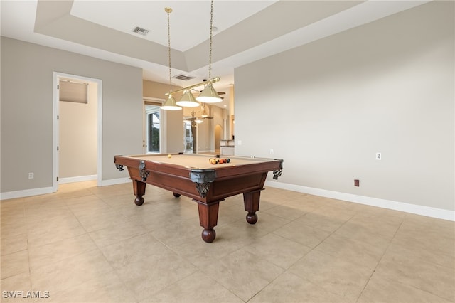 game room with light tile patterned flooring, billiards, and a tray ceiling