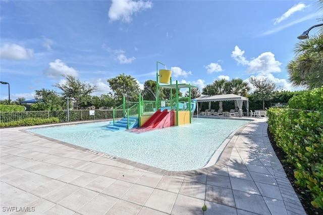 exterior space with a gazebo, a patio, and a playground