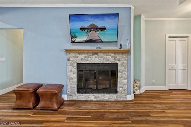 8335 Main St, Bokeelia, FL 33922 - details featuring baseboards, wood finished floors, a fireplace, and crown molding