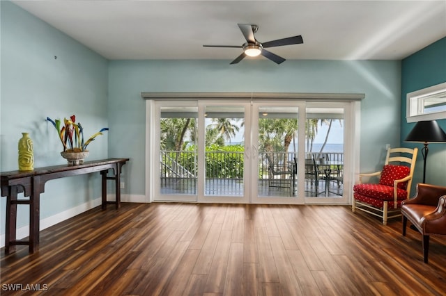 sitting room featuring hardwood / wood-style flooring and ceiling fan