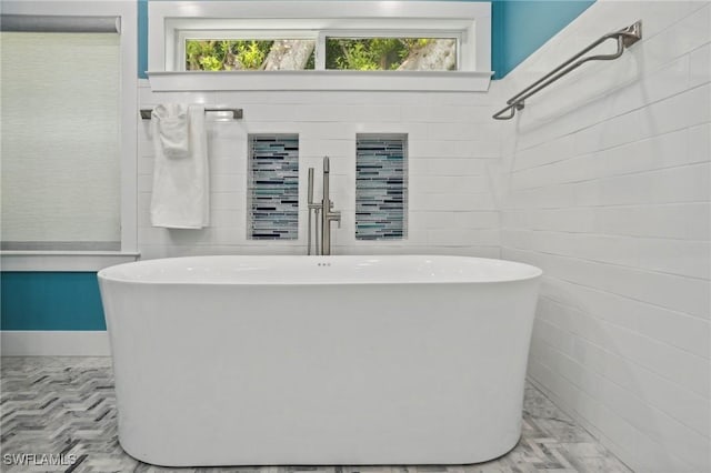 8335 Main St, Bokeelia, FL 33922 - bathroom with tile walls and a soaking tub