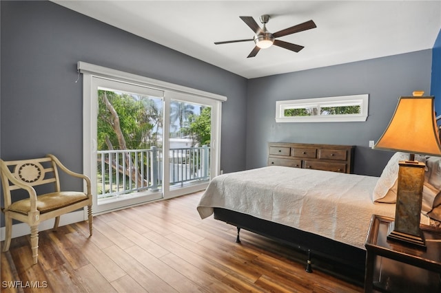 bedroom with access to outside, ceiling fan, and wood-type flooring