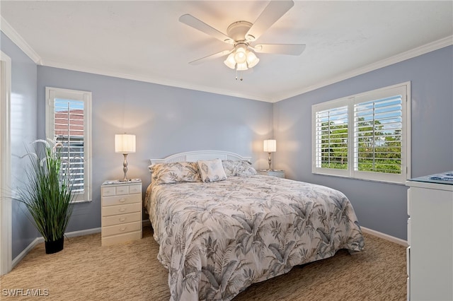 bedroom featuring ceiling fan, light colored carpet, and ornamental molding