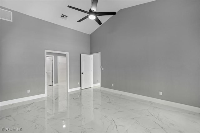 unfurnished bedroom featuring high vaulted ceiling, marble finish floor, visible vents, and baseboards