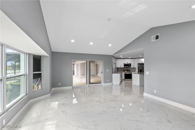 unfurnished living room with marble finish floor, recessed lighting, visible vents, a sink, and baseboards