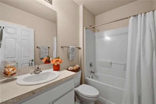 full bathroom with toilet, vanity, and shower / tub combo with curtain