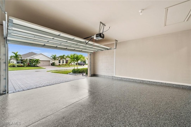 garage featuring a garage door opener