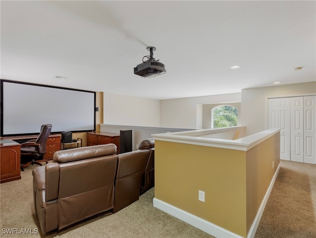 home theater room featuring carpet flooring