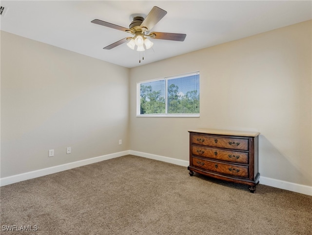 unfurnished bedroom with ceiling fan and light carpet