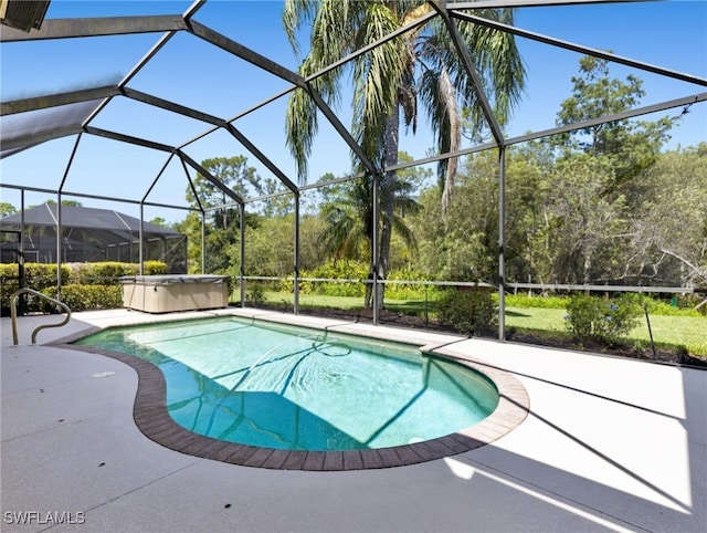 view of pool featuring a lanai and a patio area