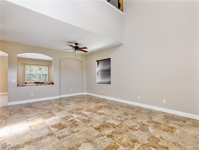 empty room featuring ceiling fan