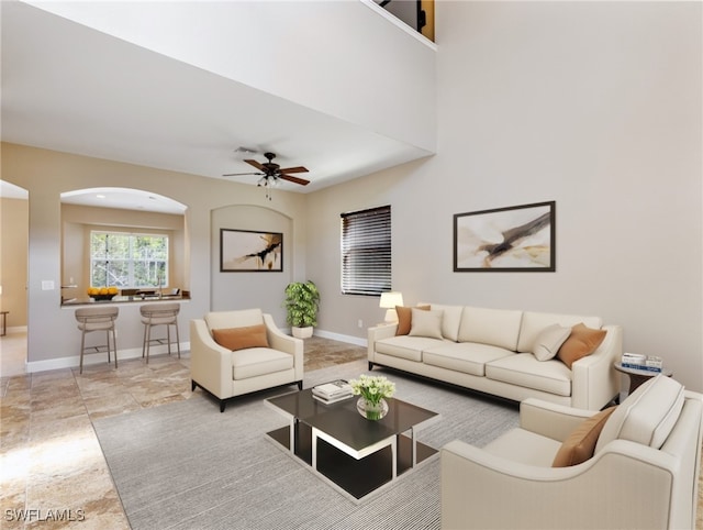 living room featuring ceiling fan