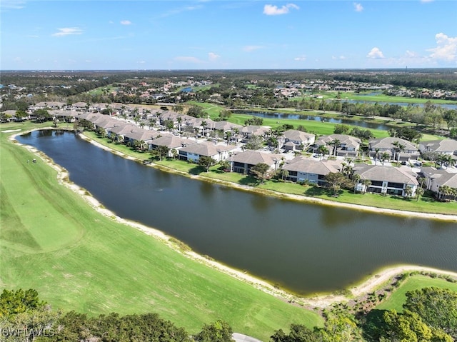 aerial view with a residential view and a water view