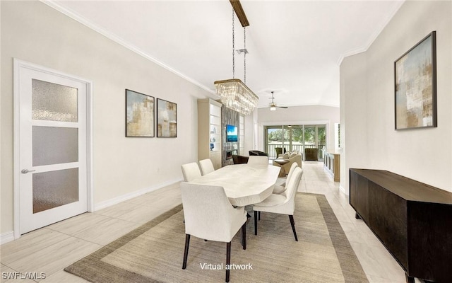 dining area with ceiling fan with notable chandelier, lofted ceiling, baseboards, and ornamental molding