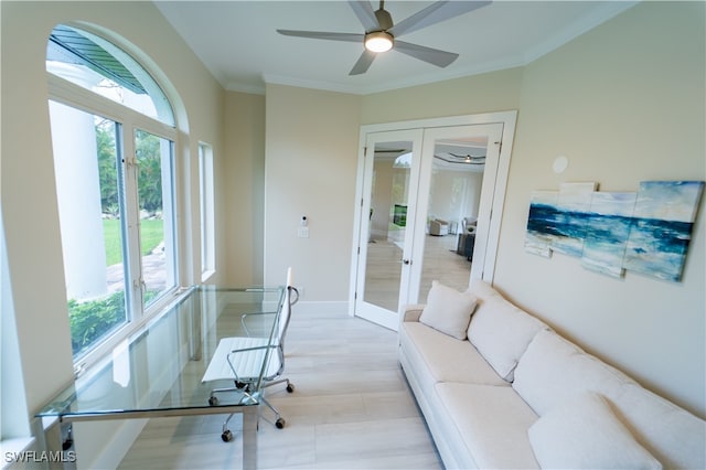 office space featuring french doors, ornamental molding, and ceiling fan