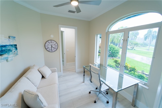 home office with ornamental molding and ceiling fan