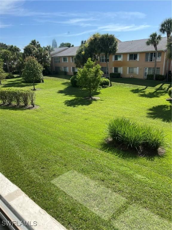 4130 Looking Glass Ln Unit 3802, Naples, FL 34112 - view of green lawn