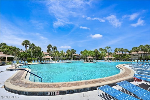 4130 Looking Glass Ln Unit 3802, Naples, FL 34112 - community pool with a patio area