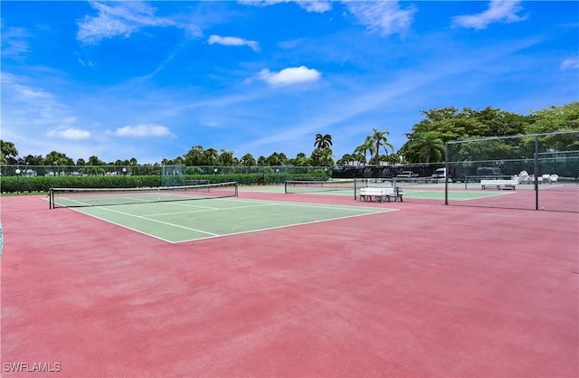 4130 Looking Glass Ln Unit 3802, Naples, FL 34112 - view of tennis court featuring community basketball court and fence