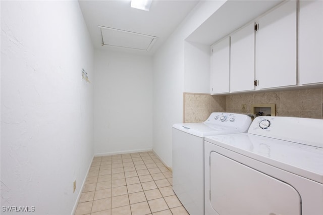 4130 Looking Glass Ln Unit 3802, Naples, FL 34112 - laundry area with cabinet space, washing machine and dryer, light tile patterned floors, and attic access